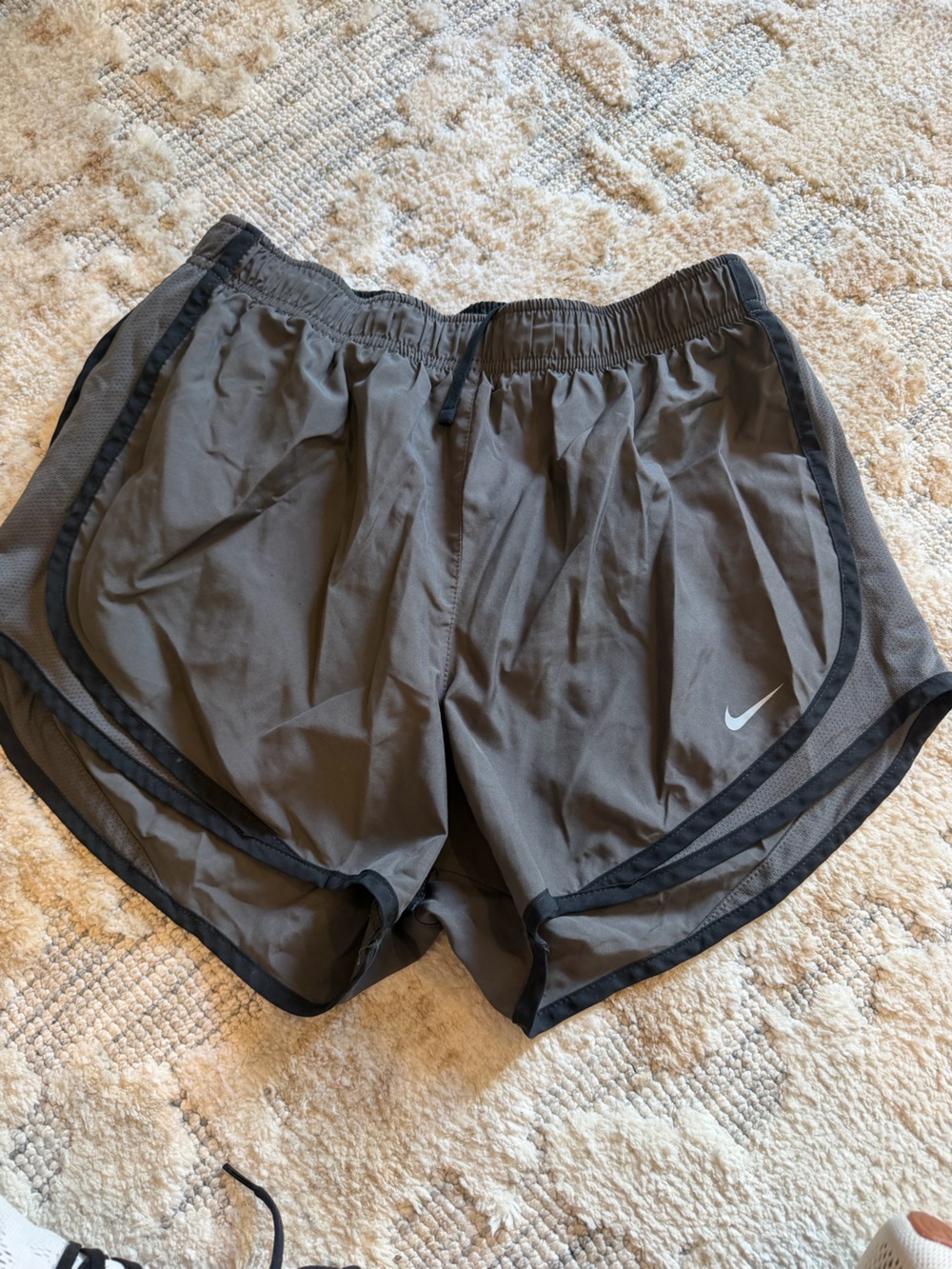 Nike Gray Running Shorts with Black Trim and White Swoosh